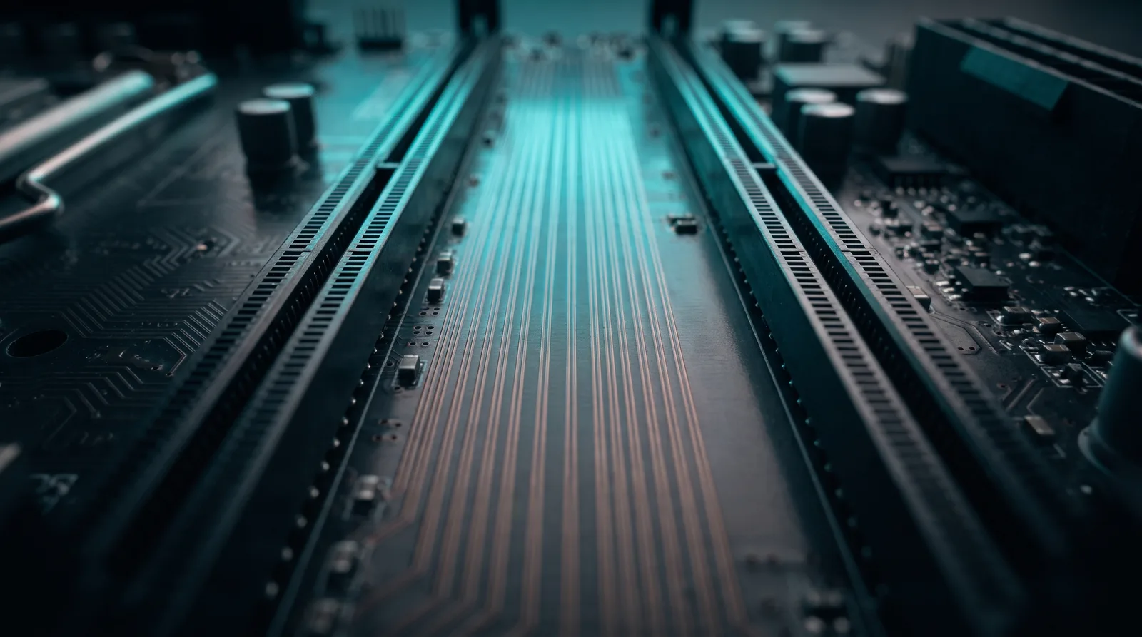 Extreme close-up of the copper memory traces on a motherboard, lit teal, the bandwidth path that bottlenecks local AI